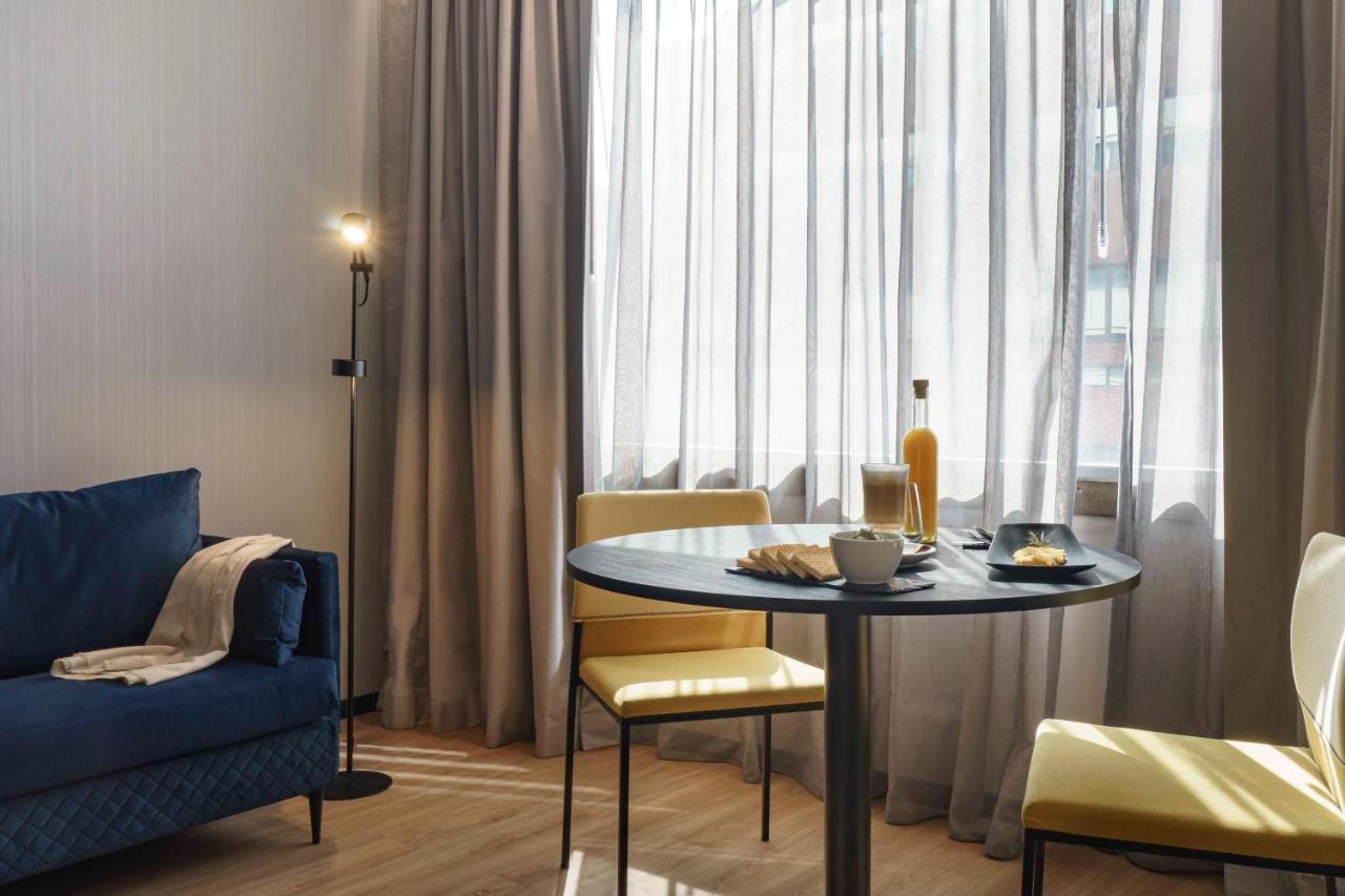 Pullman Santiago El Bosque Hotel ภายนอก รูปภาพ A room at the hotel