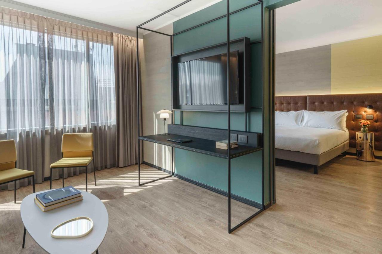 Pullman Santiago El Bosque Hotel ภายนอก รูปภาพ A room at the hotel